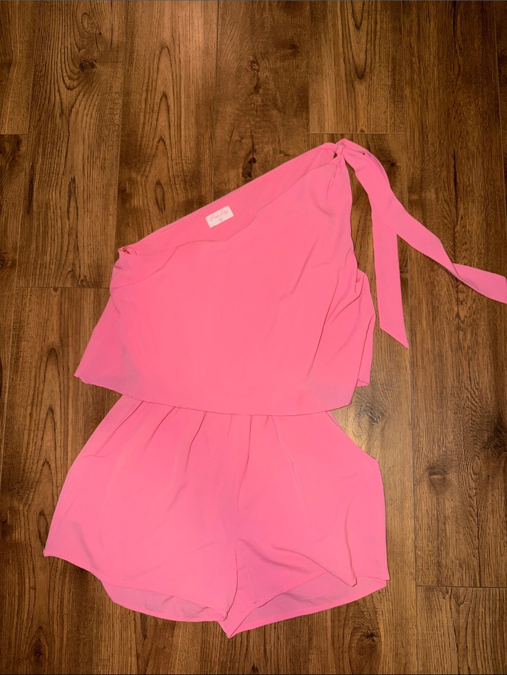 Pink Lily Bright Pink One-Shoulder Women’s Romper with Shoulder Tie